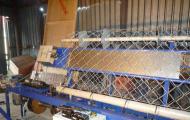 Business in the production of chain-link mesh How to offer the production of mesh for a construction company